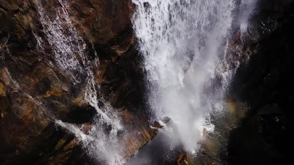 Waterfall in a Mountain Gorge in the Tropical Jungle