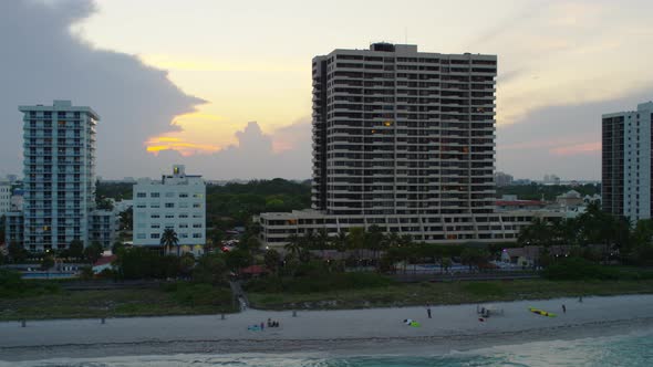 Aerial shot of tall buildings by the beach in Miami