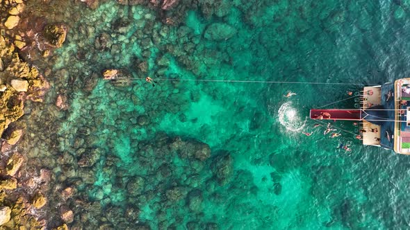 People swim in the azure sea aerial view 4 K Turkey Alanya