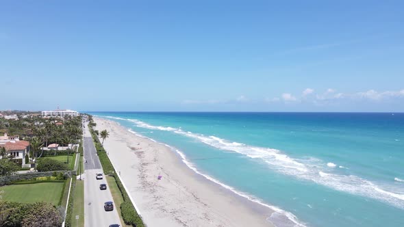 Gorgeous coastal turquoise water beach of West Palm Beach, Florida by drone