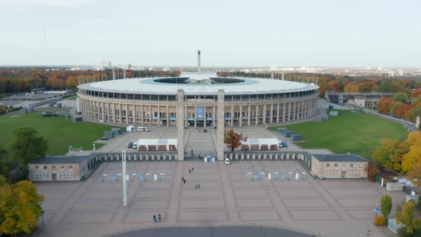 Cars Parked in Front of Olympia Stadium in Berlin, Germany, Aerial Wide View Dolly Backwards