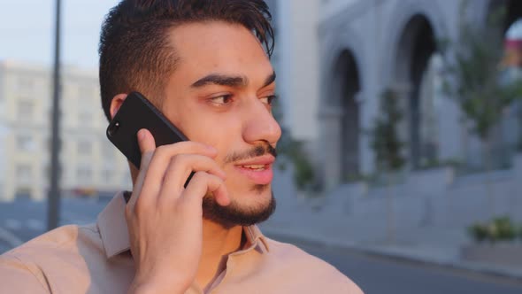 Closeup Hispanic Emotional Business Man Bearded Serious Guy Talking on Mobile Phone Answering Call