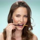 Smiling Woman with Makeup Brush - VideoHive Item for Sale