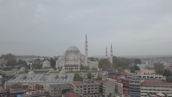 Aerial footage of Suleymaniye Mosque from a foggy day