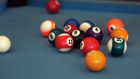 Ball being shot while playing pool