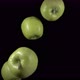 Flying Green Apples on a Black Background - VideoHive Item for Sale