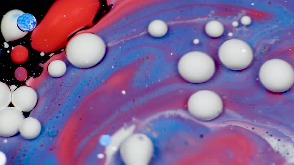 White Bubbles of Paint on the Purple Oil Surface alt