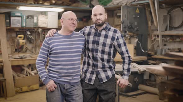 Father and Son in Their Family Carpentry Workshop