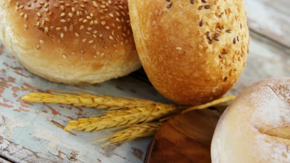 Various types of breads with wheat grains
