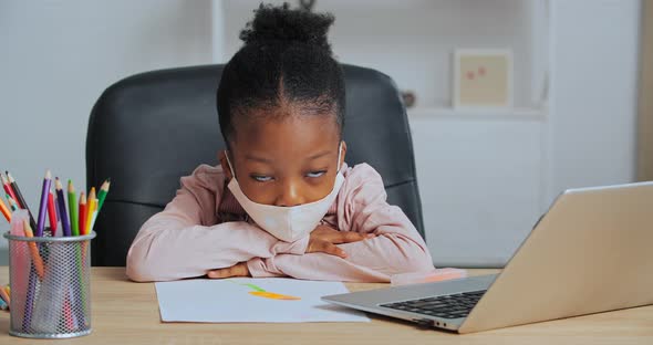 Portrait of Tired Schoolgirl Afro American Child Wears Face Mask Feels Exhaustion Stress From Hard