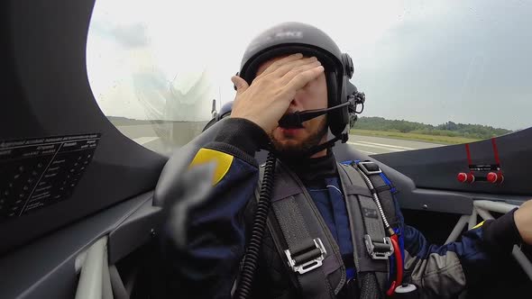 Impressed Male Passenger of Sports Plane Sitting at Cockpit After Extreme Flight