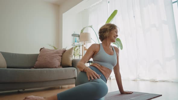 Woman making sports at home