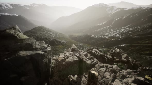 Mountains in Fog at Sunset