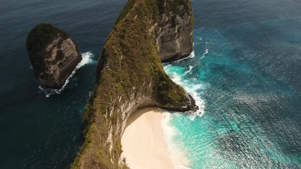 Rocky Cliff with Beach in the Sea. Karang Dawa.