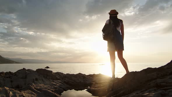 Enthusiastic Travel Backpacker Female Admiring Amazing Sunset Having Positive Emotion