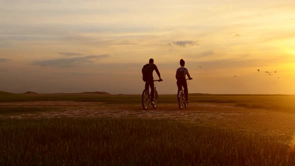 Couple Biking in Nature alt