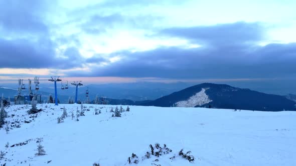 Panoramic Aerial View of Sunset Above Ski Resort