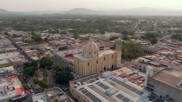 Colima Cathedral And Jardin Libertad In City Of Colima In Mexico. - aerial