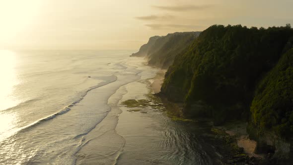Aerial Drone Flight Over South Coast on the Sunset Bali Indonesia