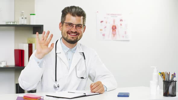 Doctor on Video Call Showing Bye Gesture