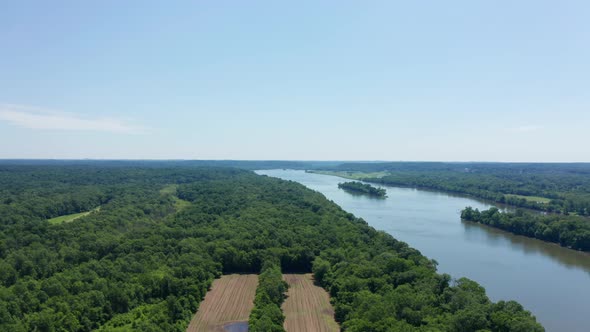 Flying over beautiful farmland and trees with the Potomac river cutting through the middle drone aer