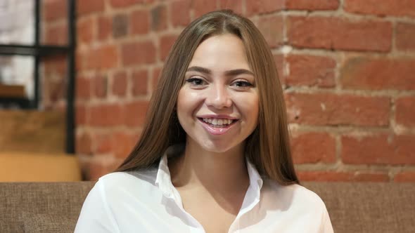 Portrait of Smiling Young Girl