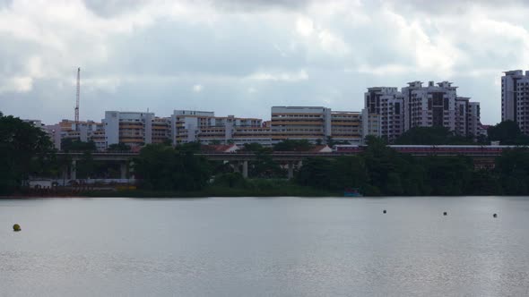 Train on elevated line approaching lakeside mrt station, Jurong East, Singapore