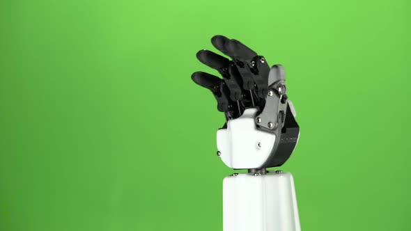 Robot Hand Close Up Waving Goodbye . Green Screen