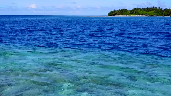 Copy space tourism of exotic shore beach by blue water with sand background near sandbank