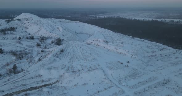 Snow-capped Mountains And Forests In Winter