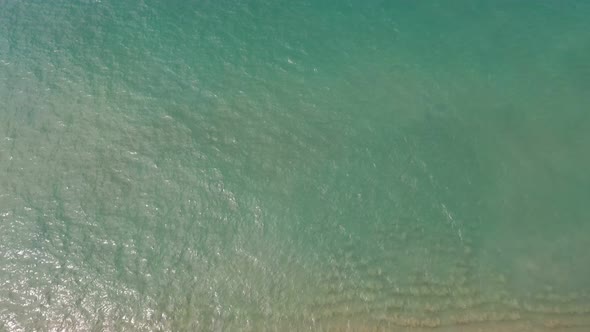 Aerial Top View Wave On The White Sand Beach.