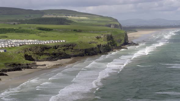 Downhill beach and Mussenden Temple on the Causeway Coastal Route, Northern Ireland.