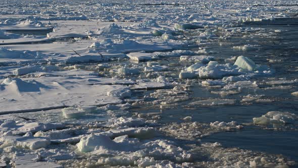 The Ice Drifts Into the Sea