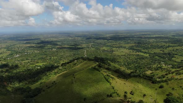 Fluffy White Clouds are Floating in the Sky Over the Valleys Dominican Republic