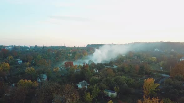 White Clouds of Smoke is Covering the Countryside as a Result of Fire in Hot Summer Weather