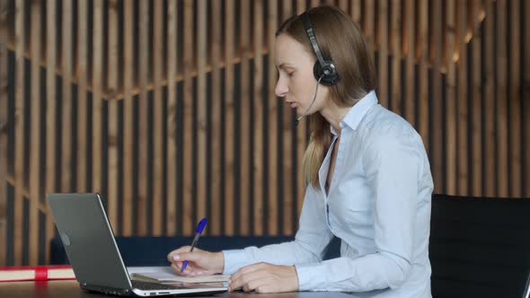 Excited Business Woman Celebrates Success in the Workplace