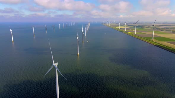 Wind Turbines in the Early Morning Wind Mill Park in the Netherlands