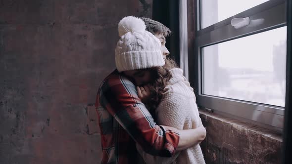 Portrait of Two Happy People in Love Wearing Winter Clothes, Having Fun Together