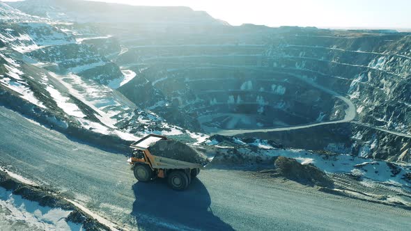 A Truck with Ore is Moving Along the Openpit Slopes
