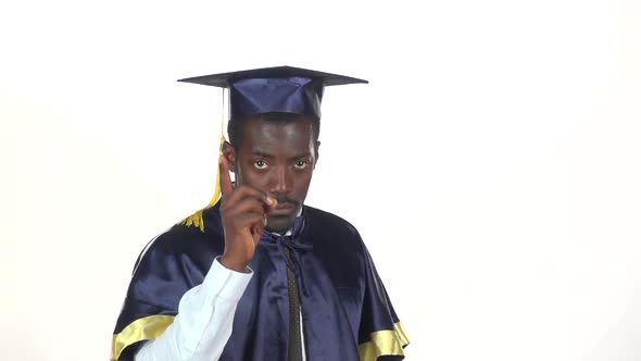 Graduate Threatens with a Finger. White. Slow Motion. Close Up