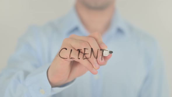 Clients, Man Writing on Transparent Screen