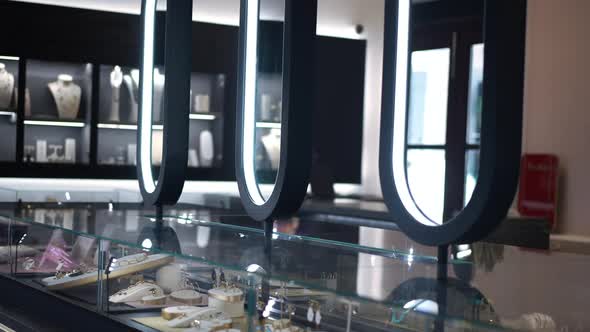 Mirrors in Jewellery Store Above Shelves with High Fine Jewelry Indoors
