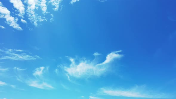 Tropical fly over travel shot of a sunshine white sandy paradise beach and blue water background in 