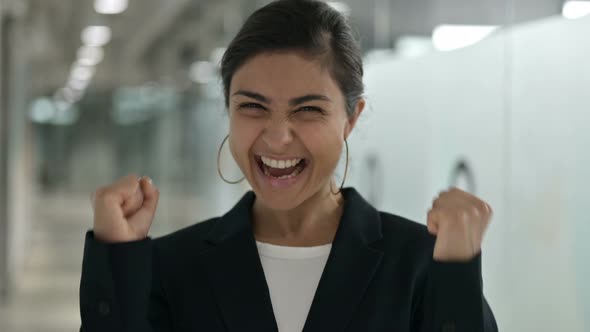 Excited Indian Businesswoman Celebrating Success
