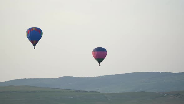 Beautiful Rocky Landscape of Crimea with Colorful Hotair Balloons Balloons Flying on Sunset HDR Time