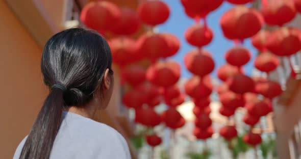 Woman look at the red lantern