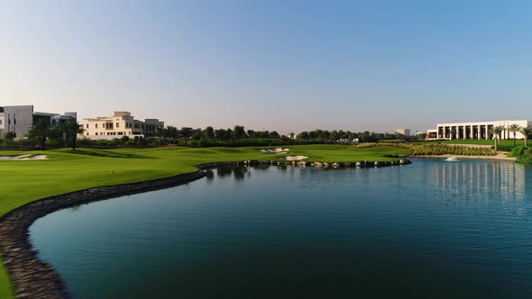 Aerial view of luxury golf club with artificial pond, Dubai, U.A.E.