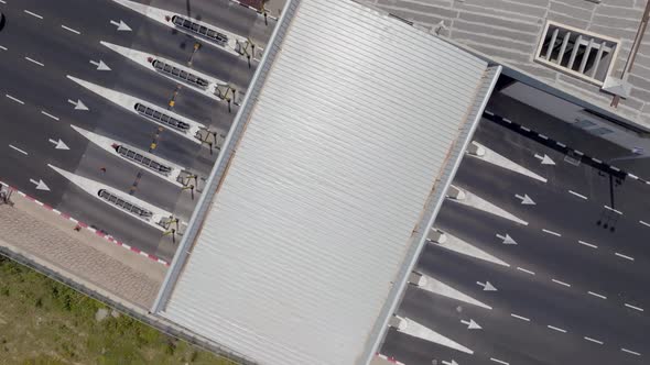 Time lapse of Traffic entering and leaving a toll road, Aerial view.