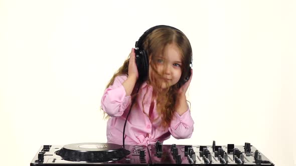 Sweet Girl with Curls Plays for Dj Console, Slow Motion