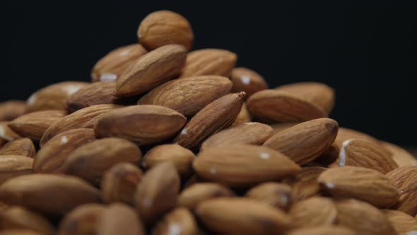 Pile Of Almonds An A Wooden Table